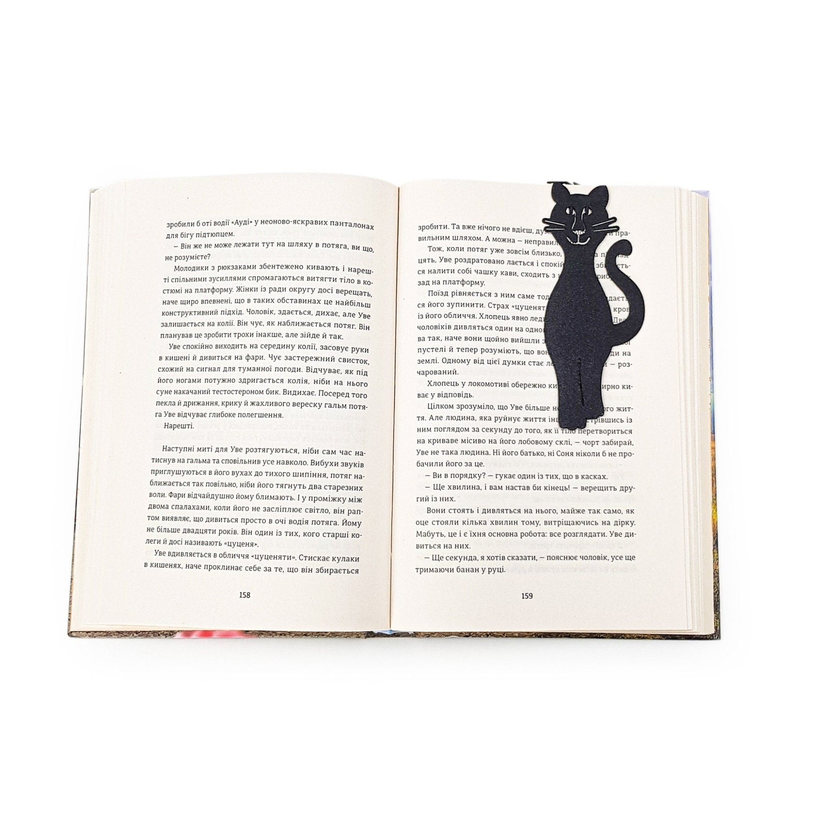 Mew Smiling Cat Bookmark - Whimsical and Cheerful Design for Cat Lovers and Avid Readers - Atelier Article