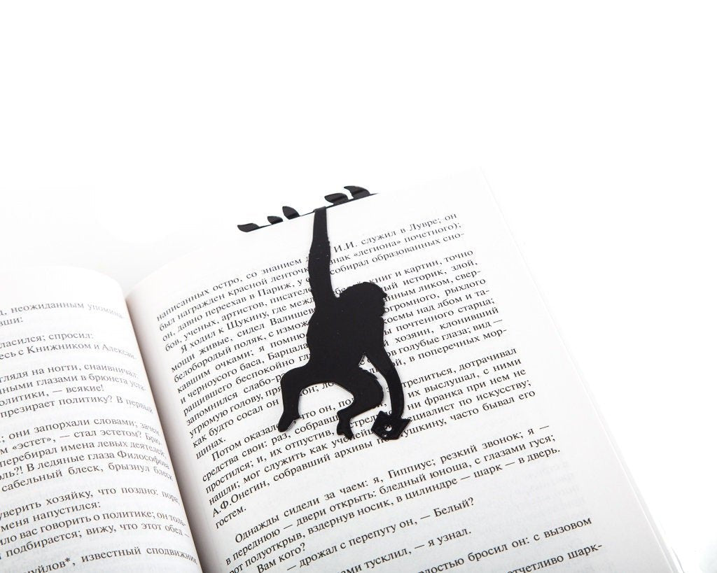 Monkey, Library in the Jungle metal bookmark marking a page in an open book