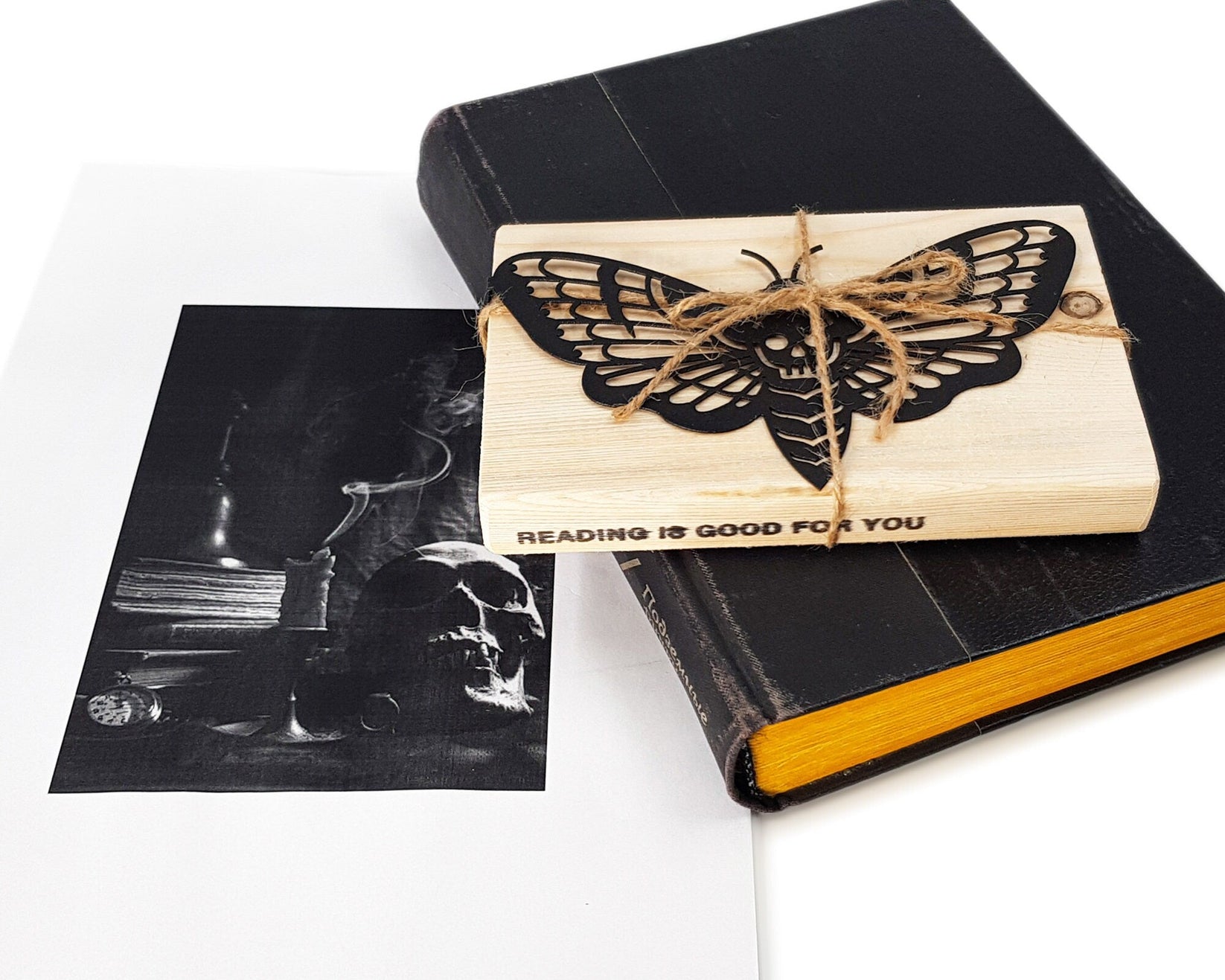 Moth of Death metal bookmark with the engraved wooden gift block it ships with