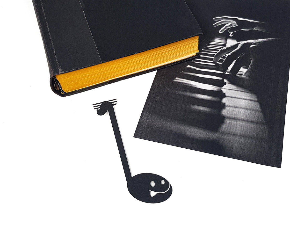 Musical Note metal bookmark against a coloured backdrop