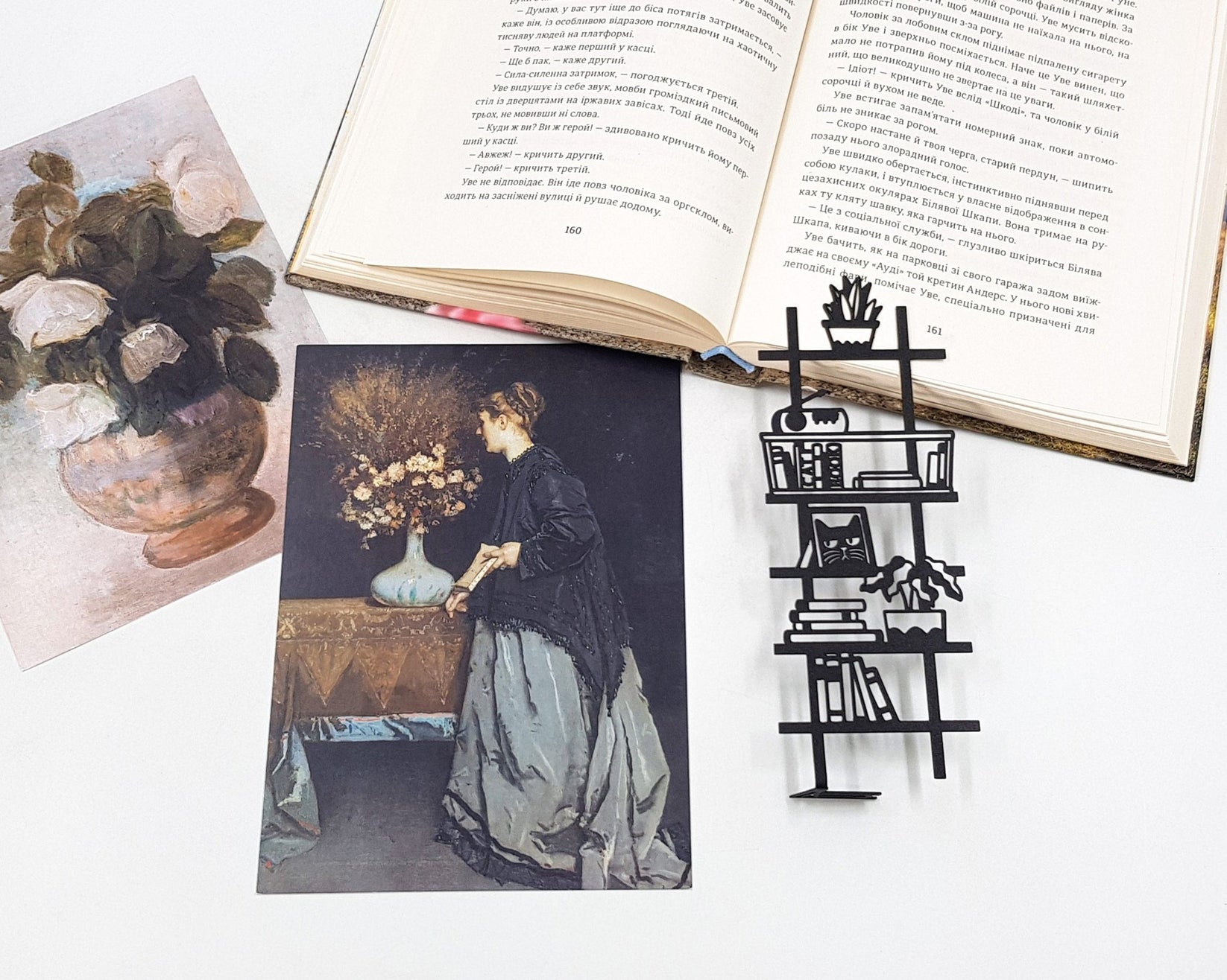 My Bookshelf metal bookmark placed on a colour illustration