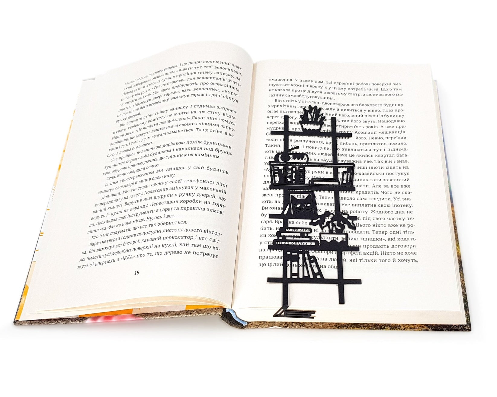 My Bookshelf metal bookmark marking a page in an open book