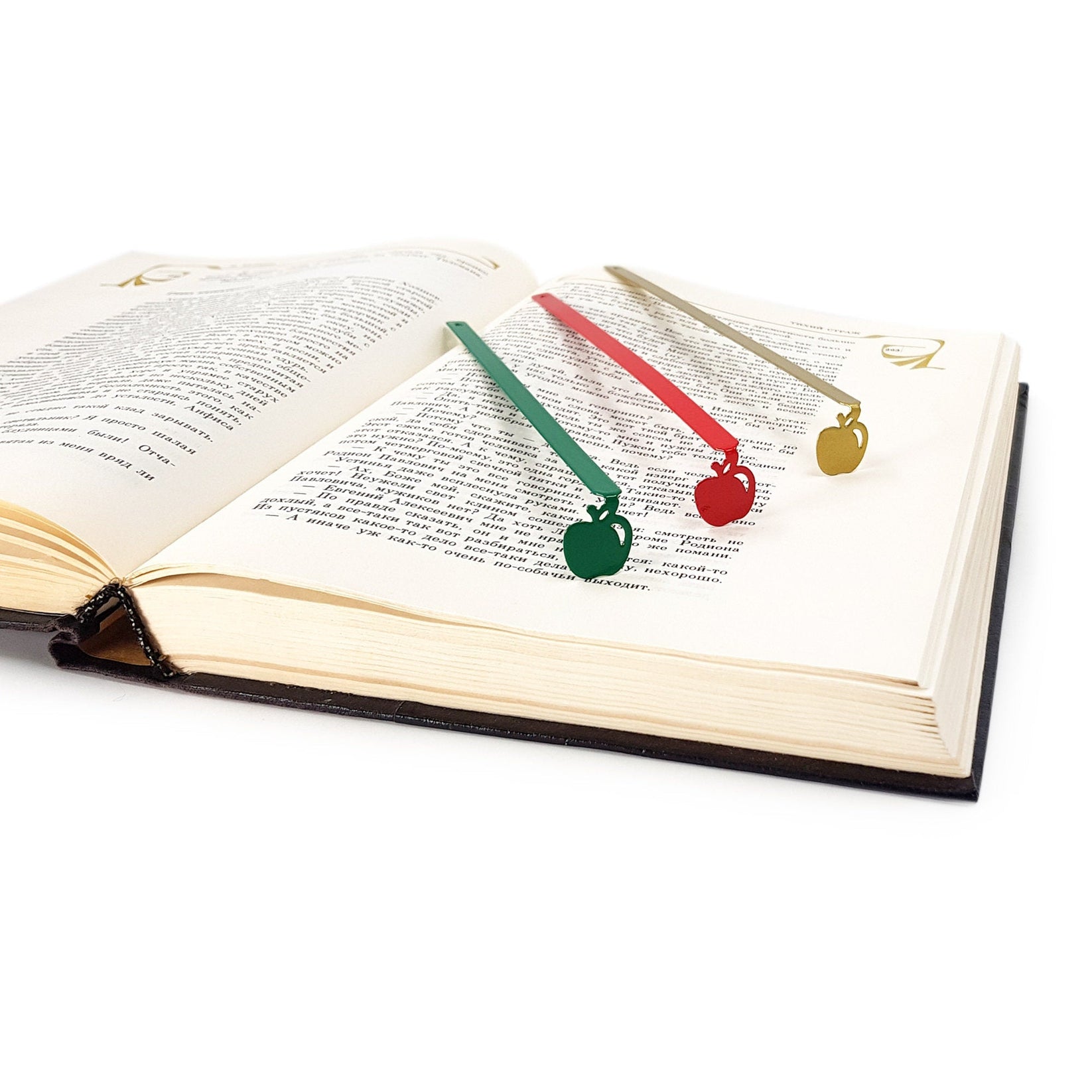 Paradise Apple' metal bookmark shown together with other bookmarks from the range