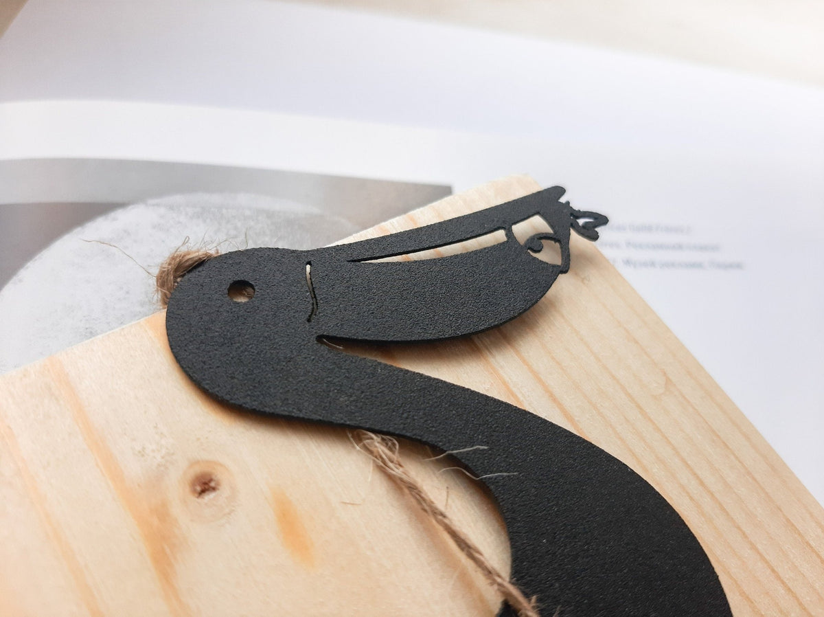 Pelican metal bookmark a close view of the cut lines