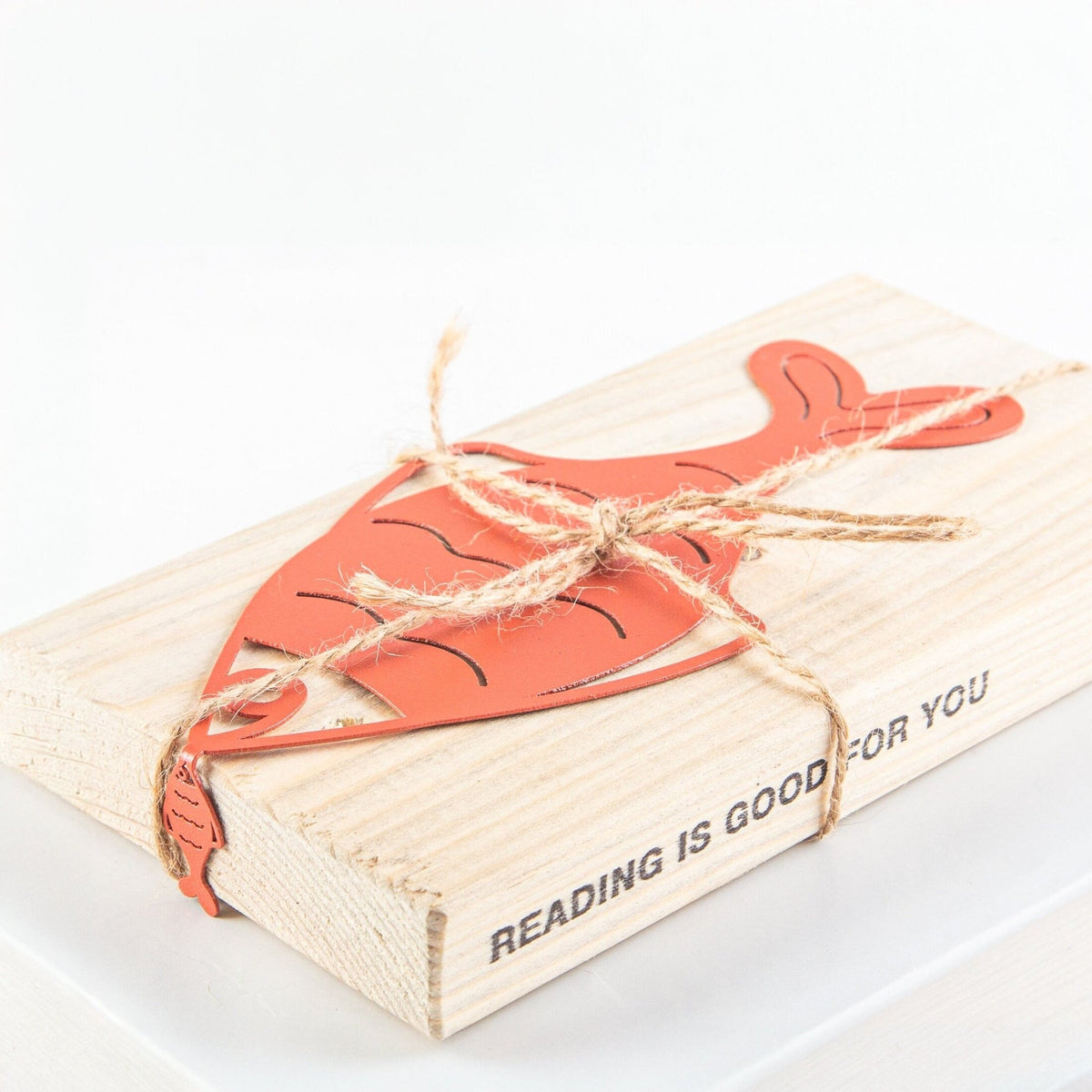 Perch metal bookmark in red packed with kraft paper and twine as a gift