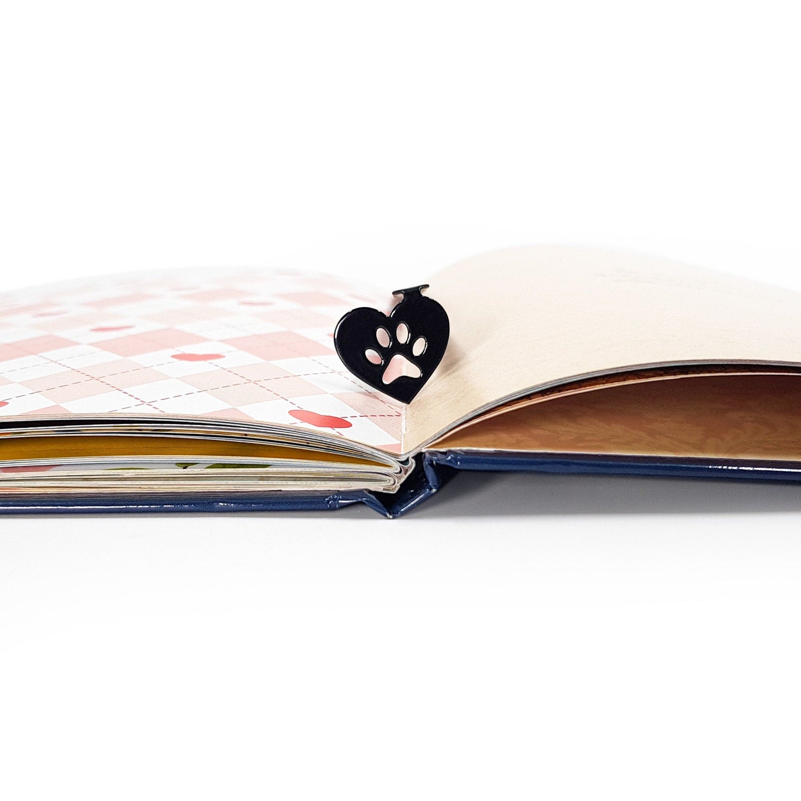 Pet Love metal bookmark against a coloured backdrop