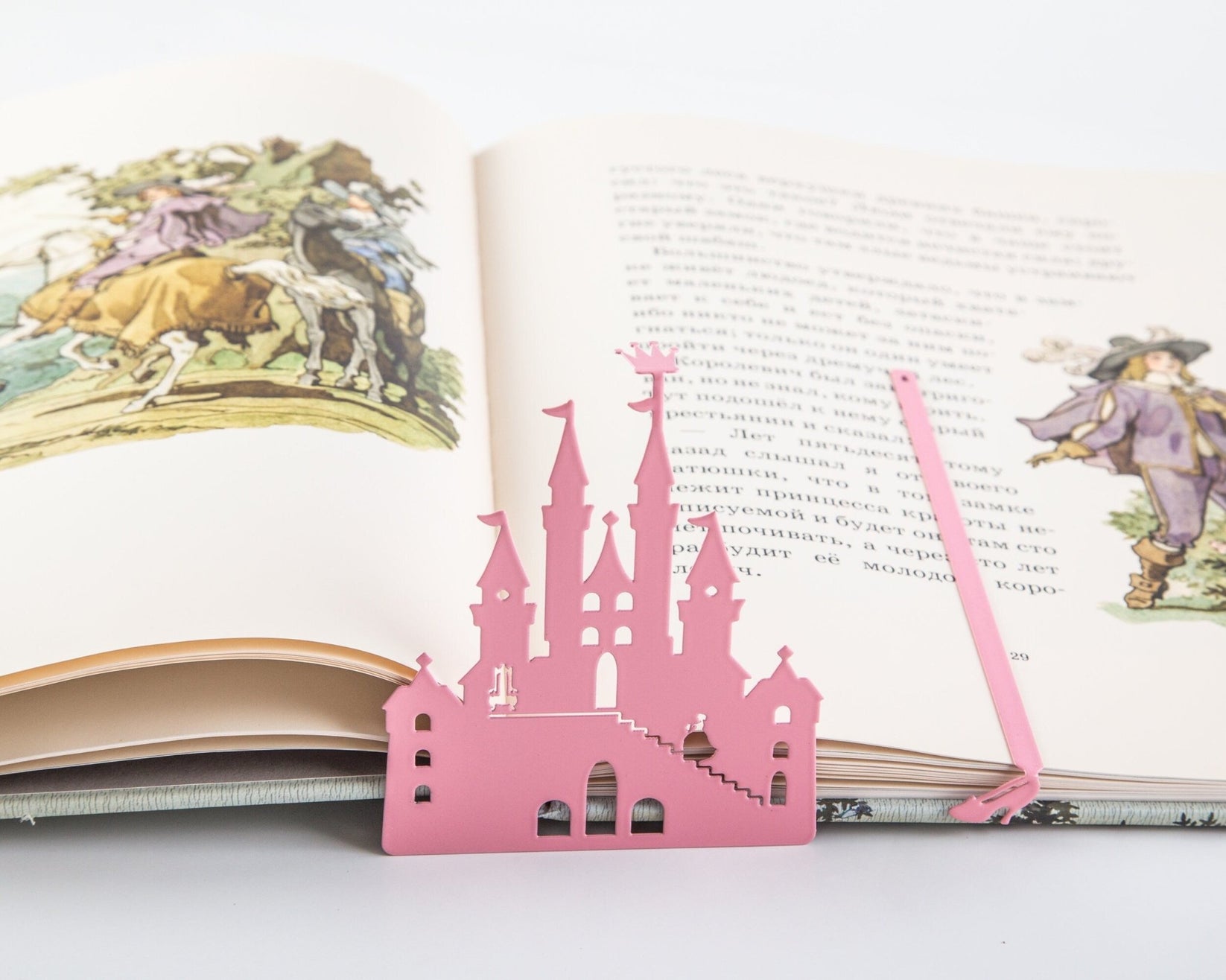 Princess Castle in Pink metal bookmark in red on an illustrated page, view 5