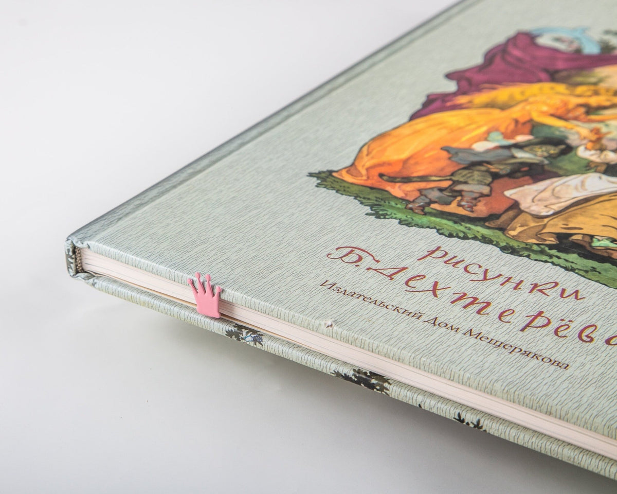 Princess Castle in Pink metal bookmark in red placed on a colour illustration, view 6