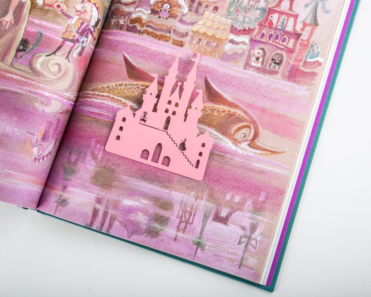 Princess Castle in Pink metal bookmark in red marking a page in an illustrated book, view 7