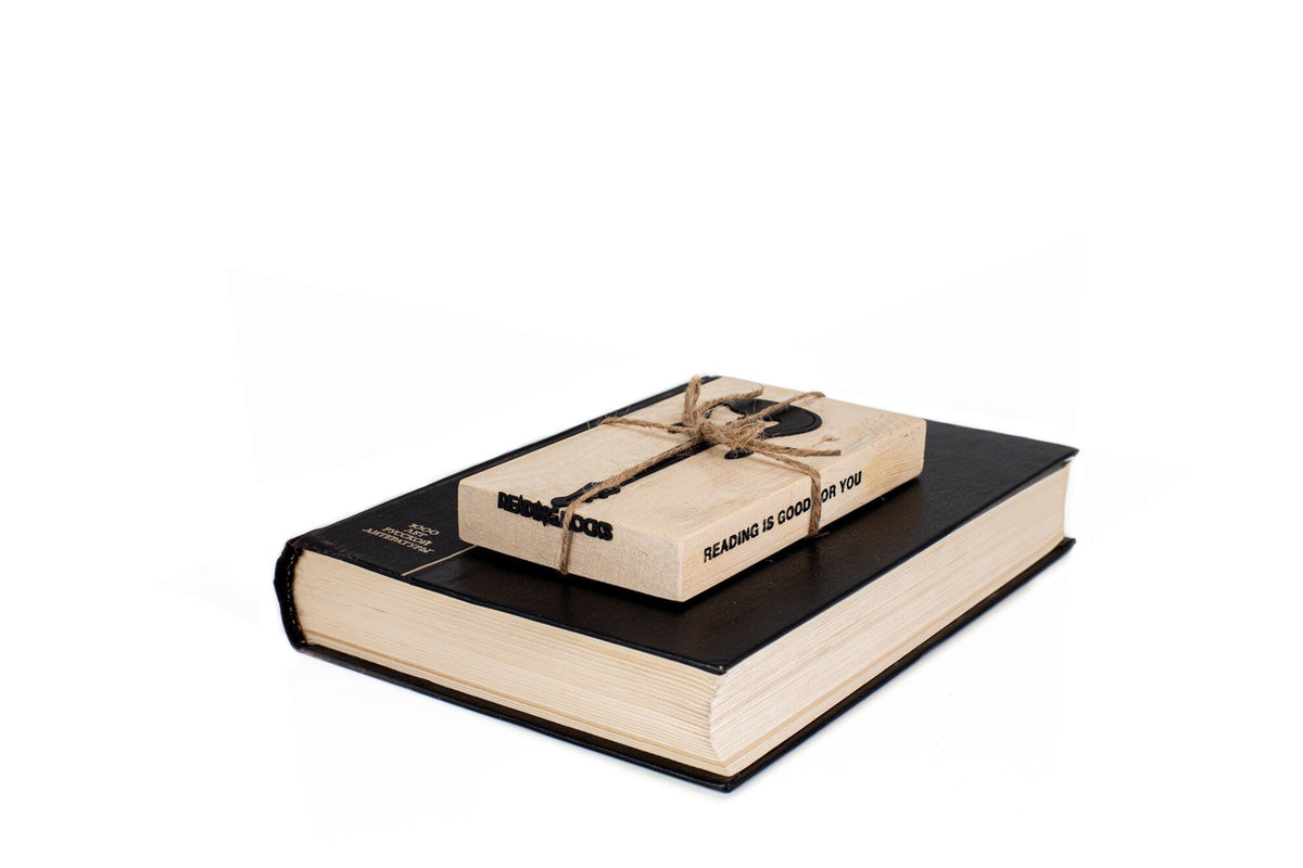 Reading Rocks metal bookmark packed with kraft paper and twine as a gift