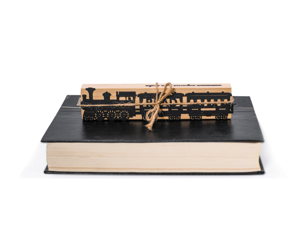 Reading Train metal bookmark shown with its wooden gift block