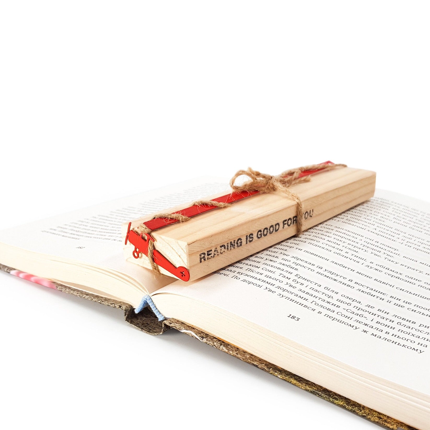 Red Biplane metal bookmark in red with the engraved wooden gift block it ships with