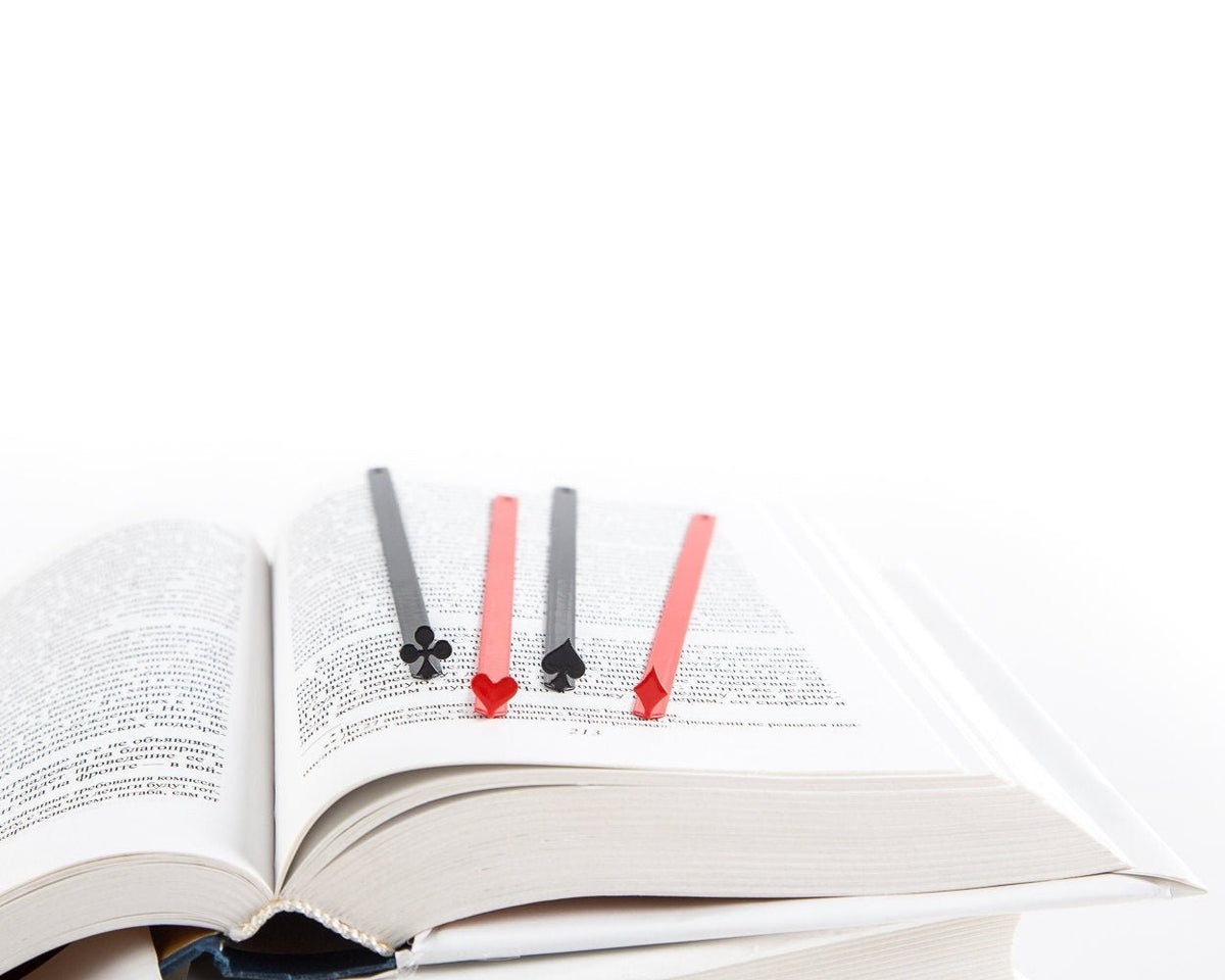 Red Heart metal bookmark in red shown together with other bookmarks from the range