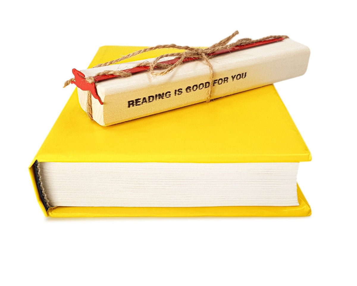 Red Rabbit metal bookmark in red with the engraved wooden gift block it ships with