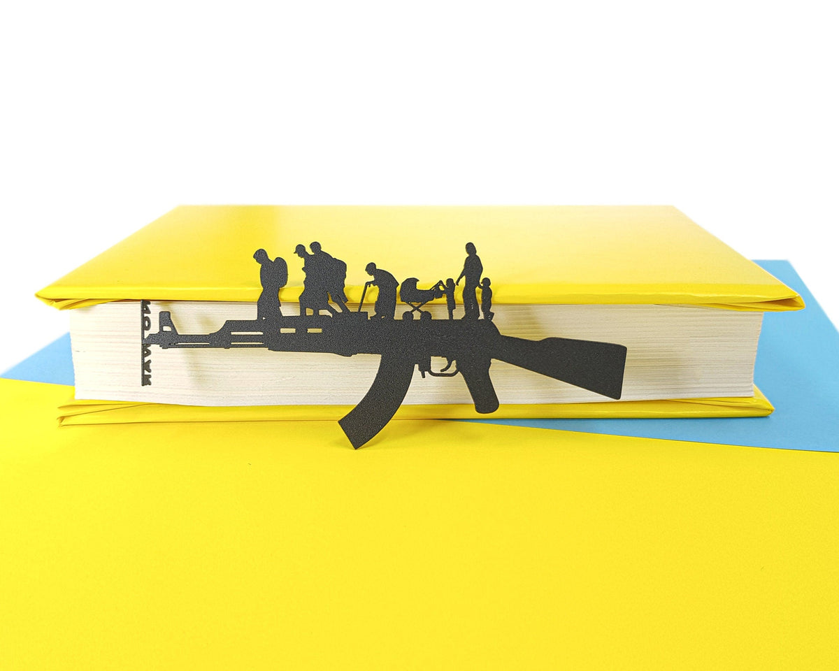 Refugees, No War in Ukraine metal bookmark on a coloured background, view 4