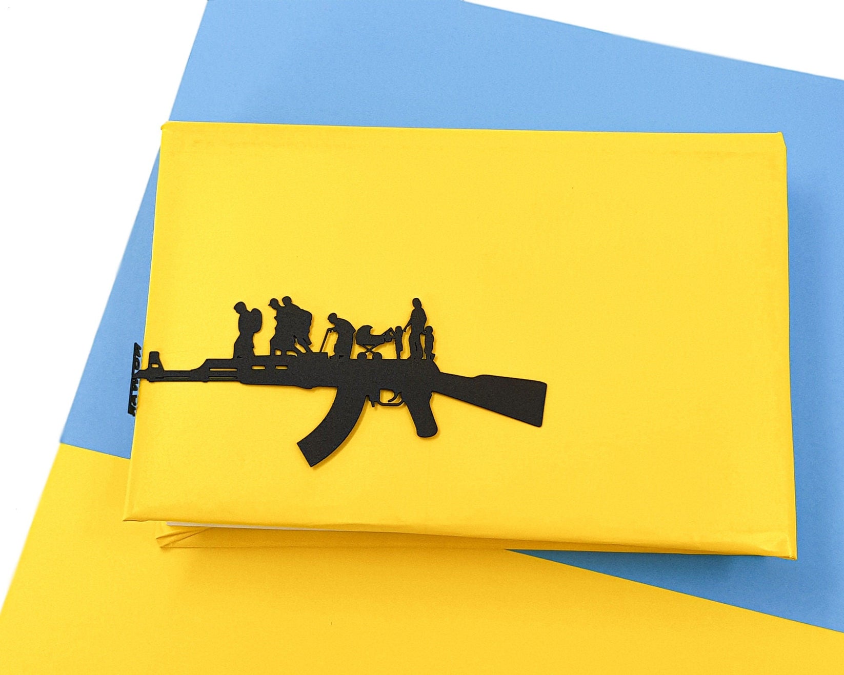 Refugees, No War in Ukraine metal bookmark on a coloured background