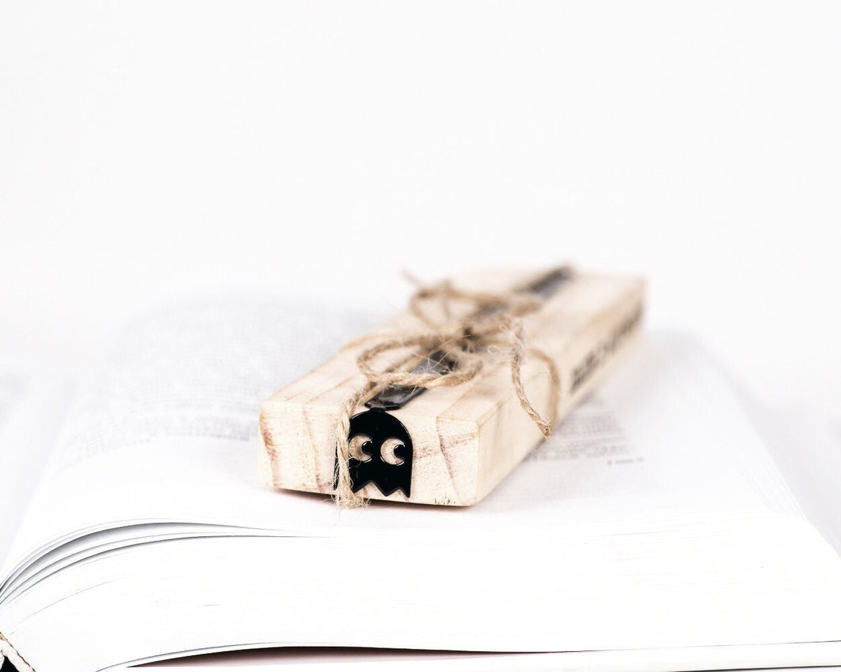Retro Ghost metal bookmark with the engraved wooden gift block it ships with