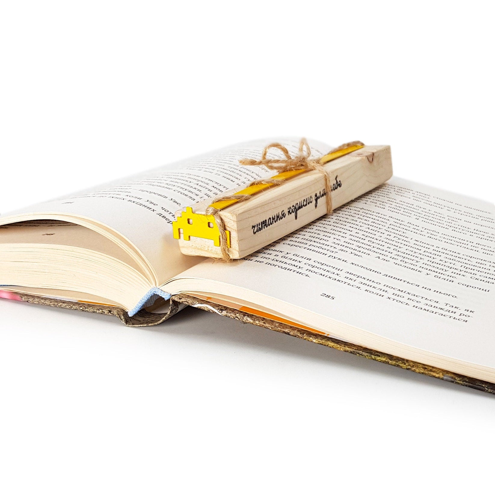 Retro Monster metal bookmark with the engraved wooden gift block it ships with