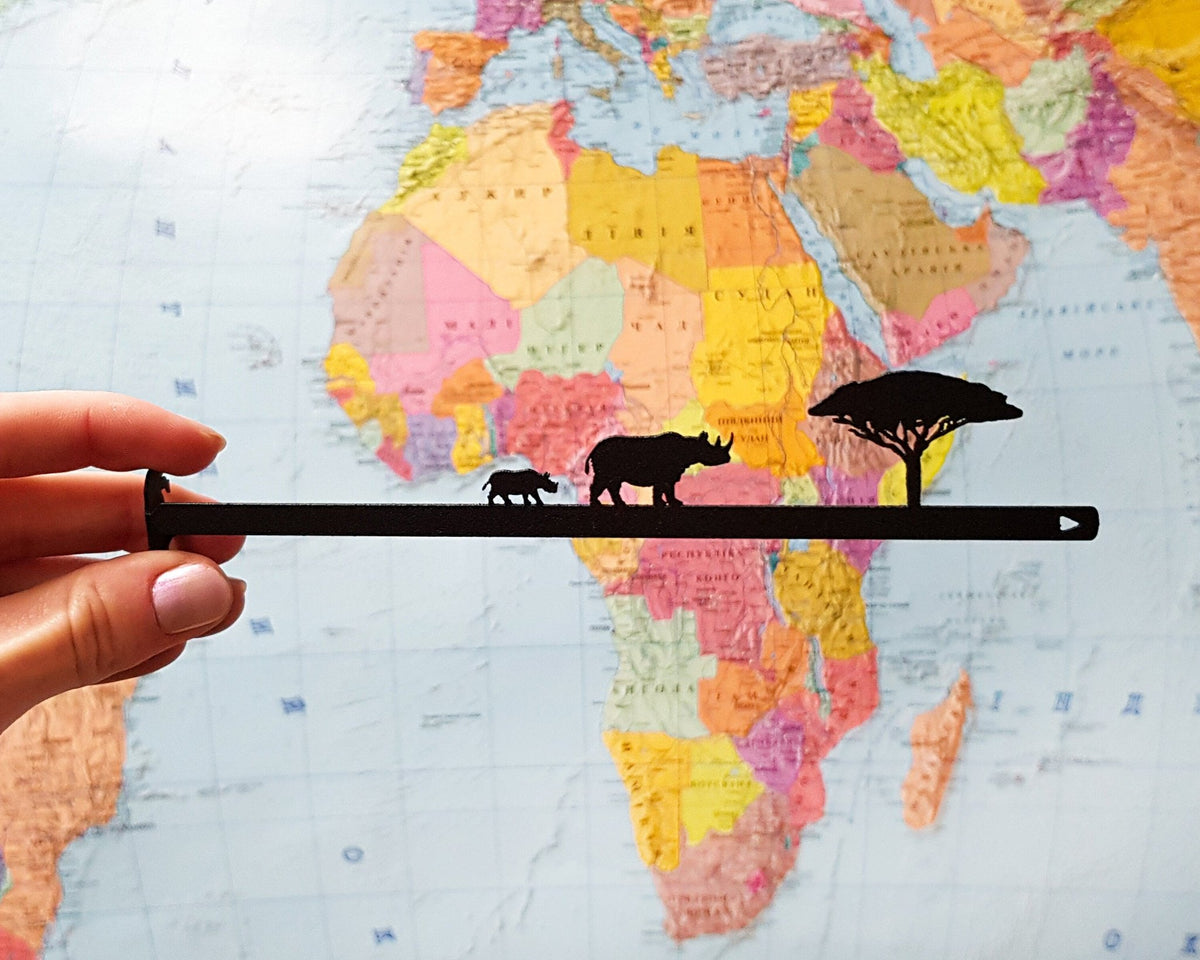 Rhinos metal bookmark against a coloured backdrop