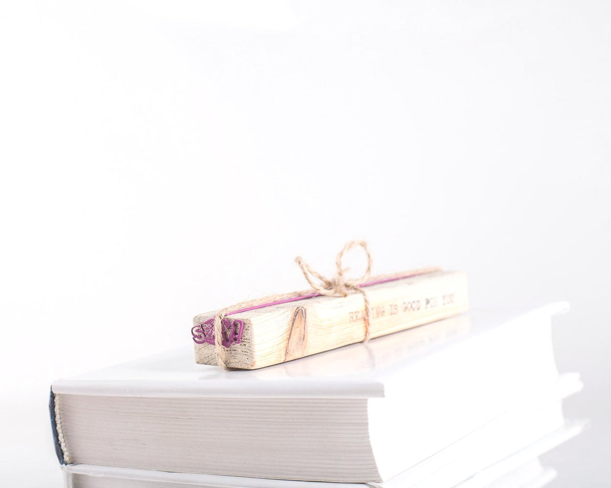 Sexy Smart metal bookmark with the engraved wooden gift block it ships with