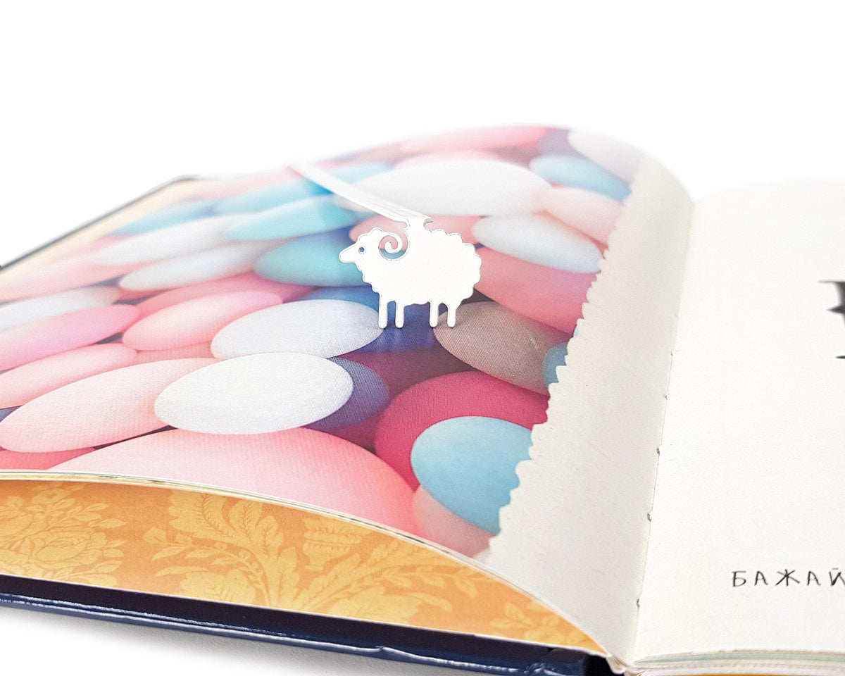 Sheep metal bookmark on a coloured background