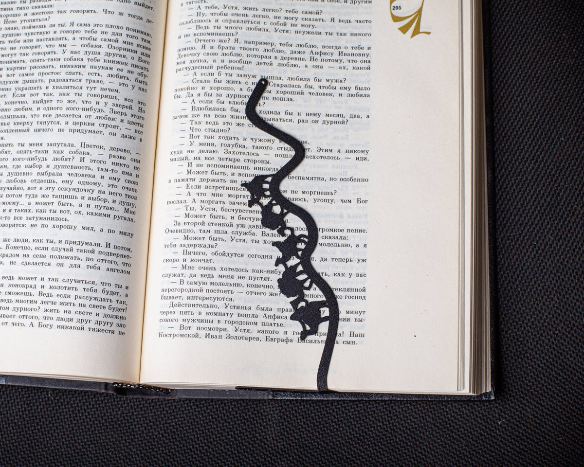 Silk Road metal bookmark against a coloured backdrop