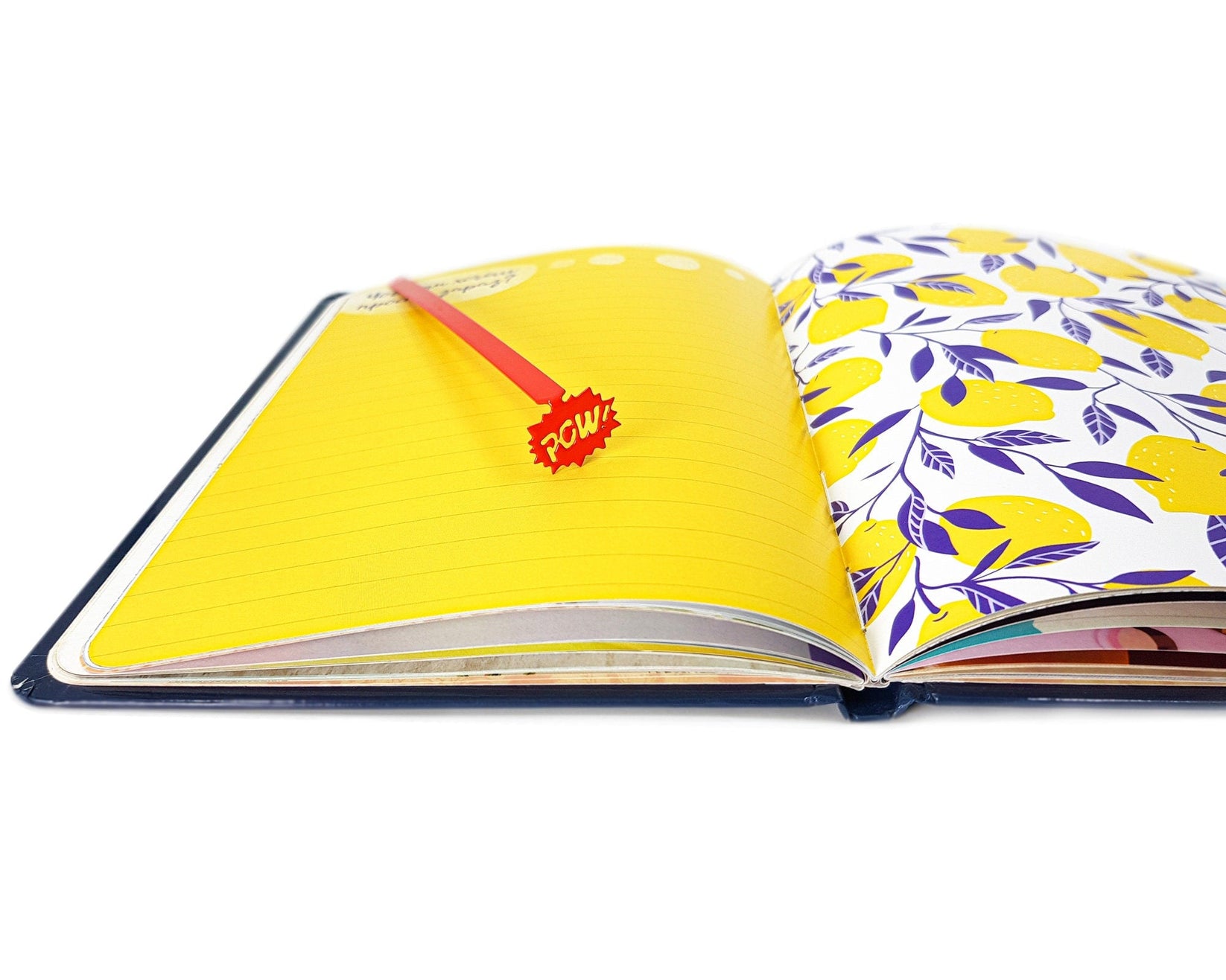 Speech Bubble Pow metal bookmark in red shot on a coloured surface