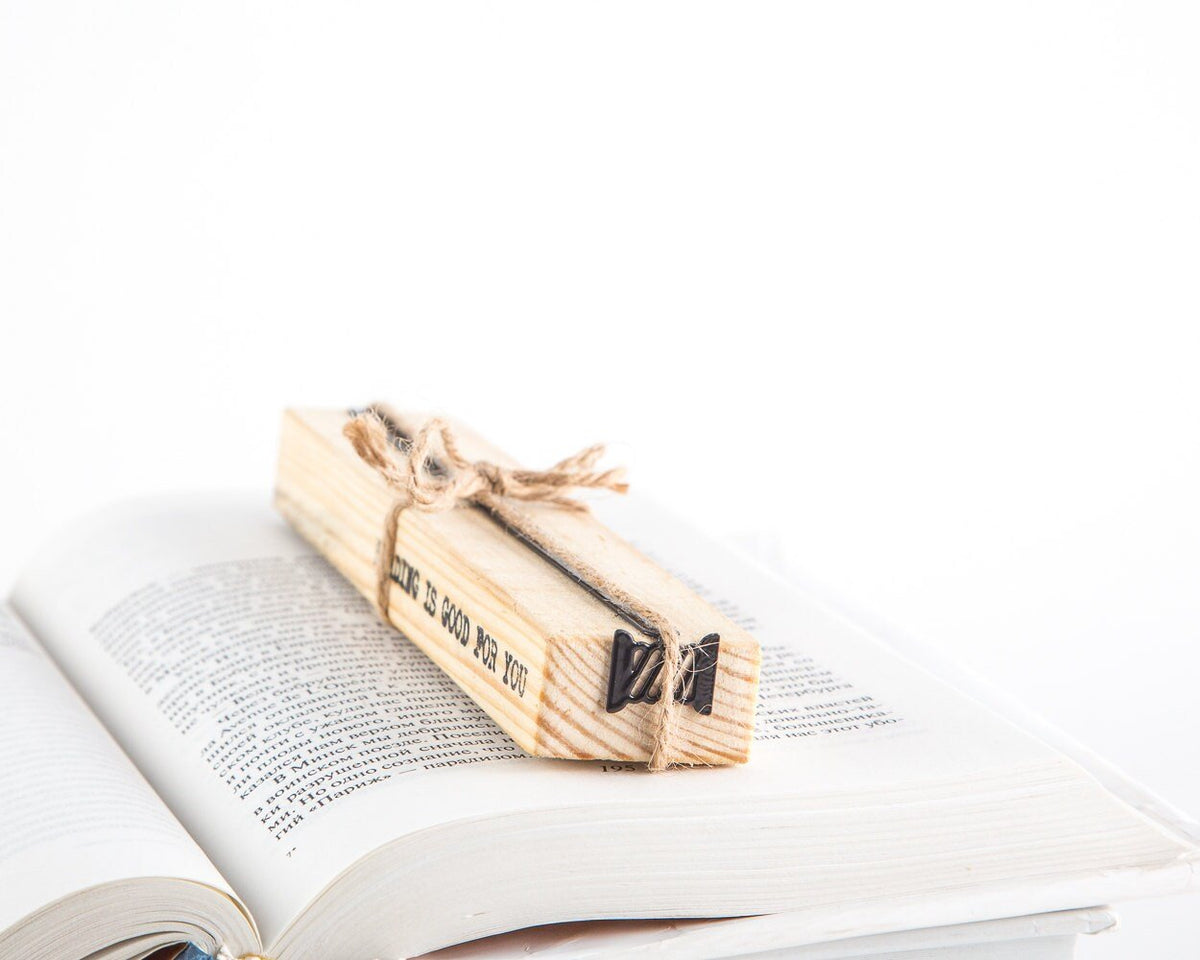 Spool of Thread metal bookmark with the engraved wooden gift block it ships with