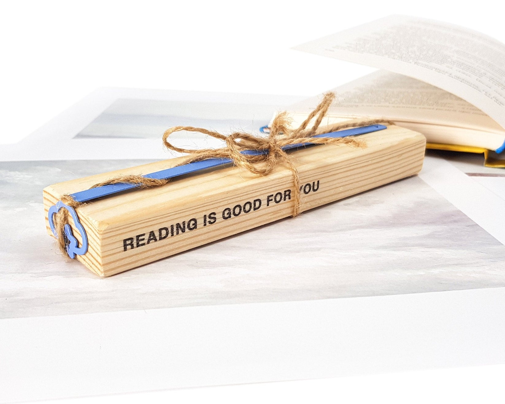 Star Cloud metal bookmark in blue with the engraved wooden gift block it ships with