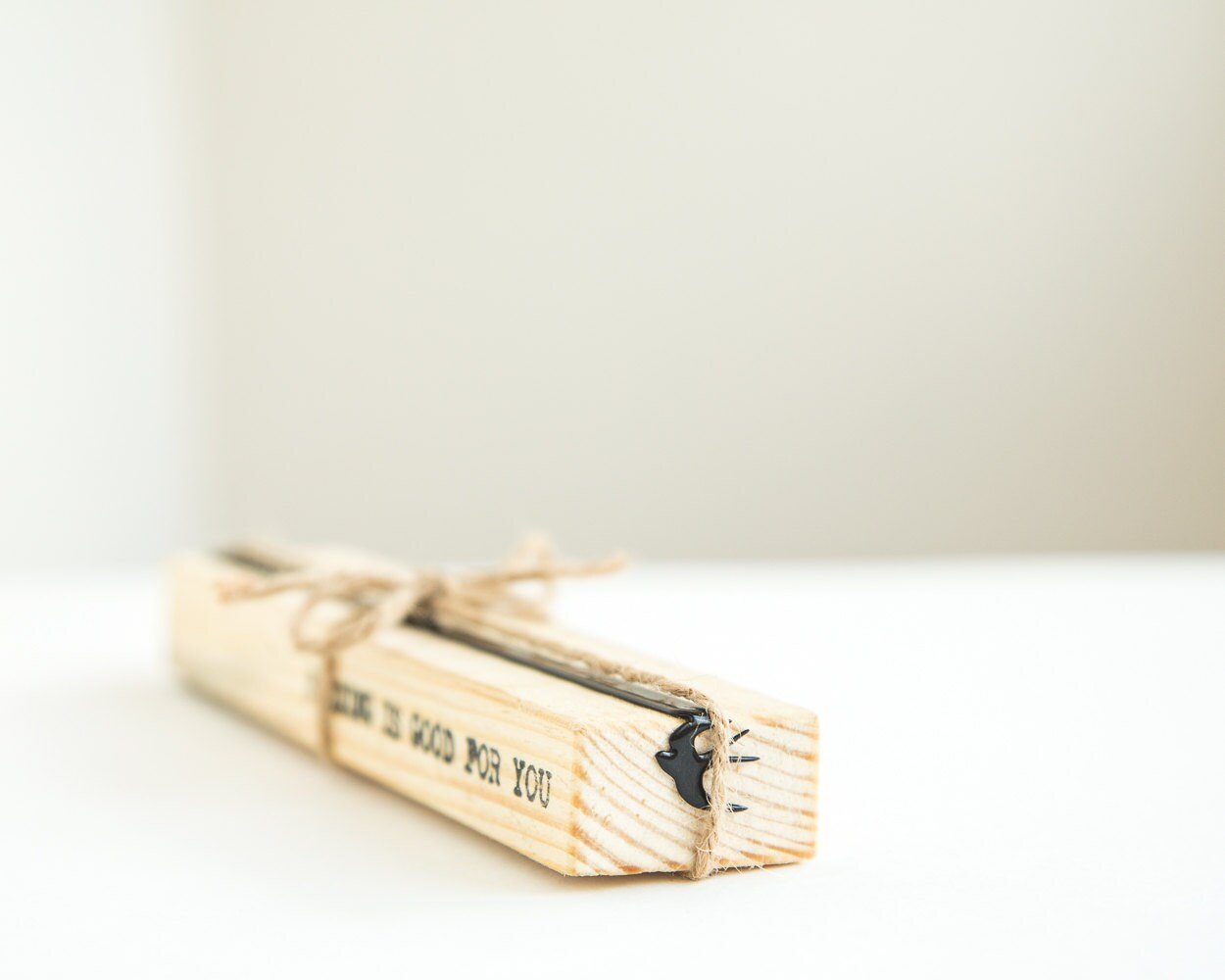 Swallow metal bookmark with the engraved wooden gift block it ships with