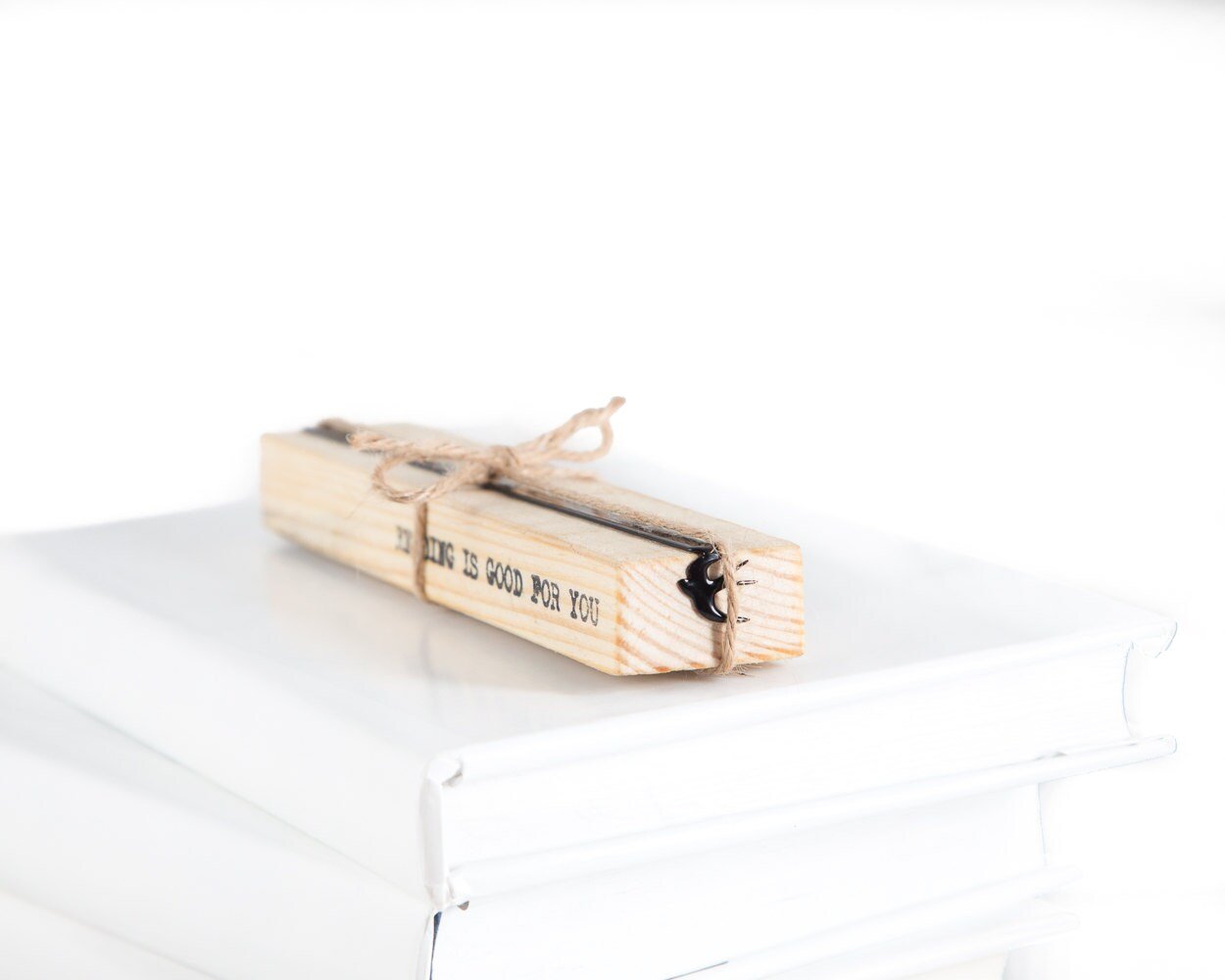 Swallow metal bookmark packed with kraft paper and twine as a gift