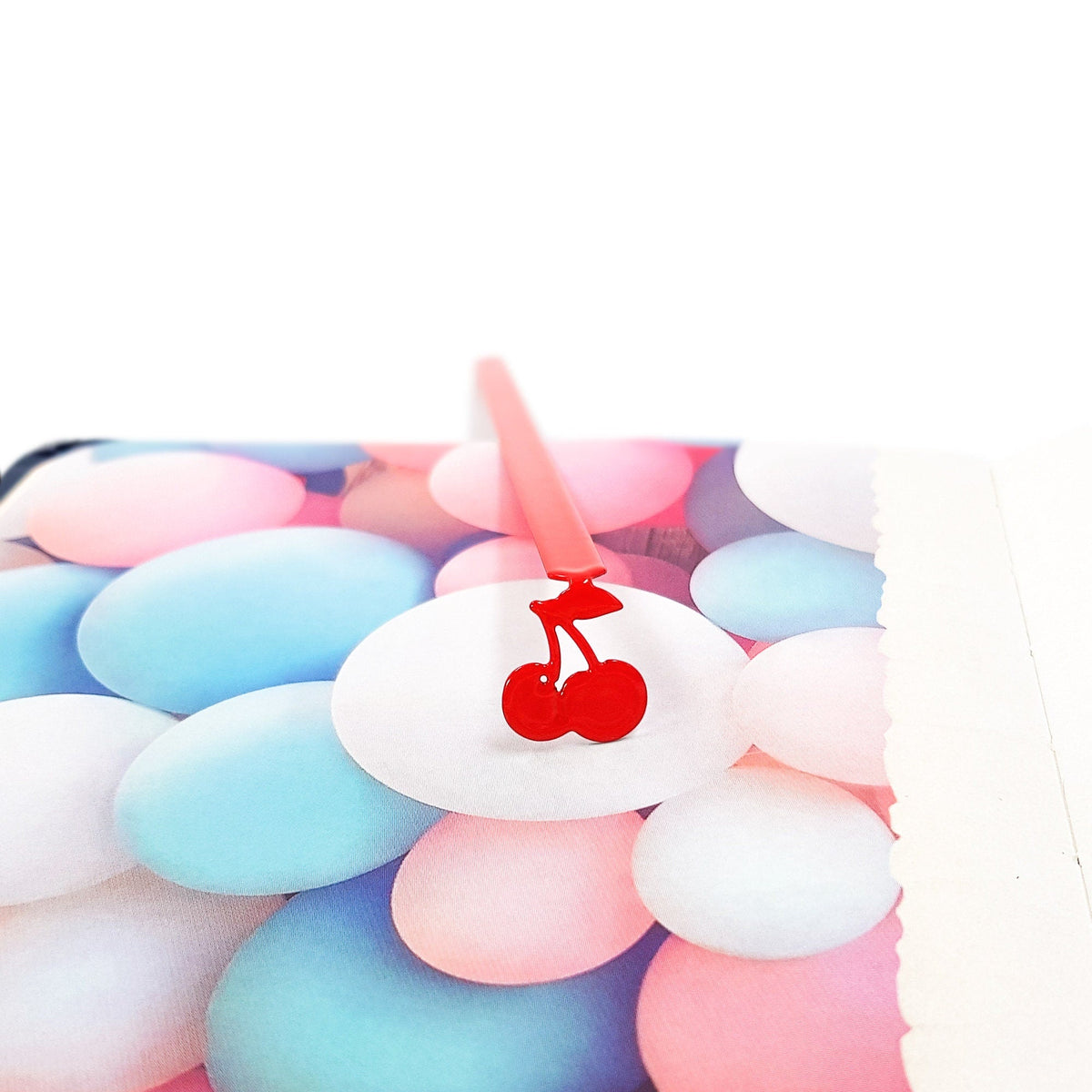 Sweet Cherries metal bookmark in red shot on a coloured surface