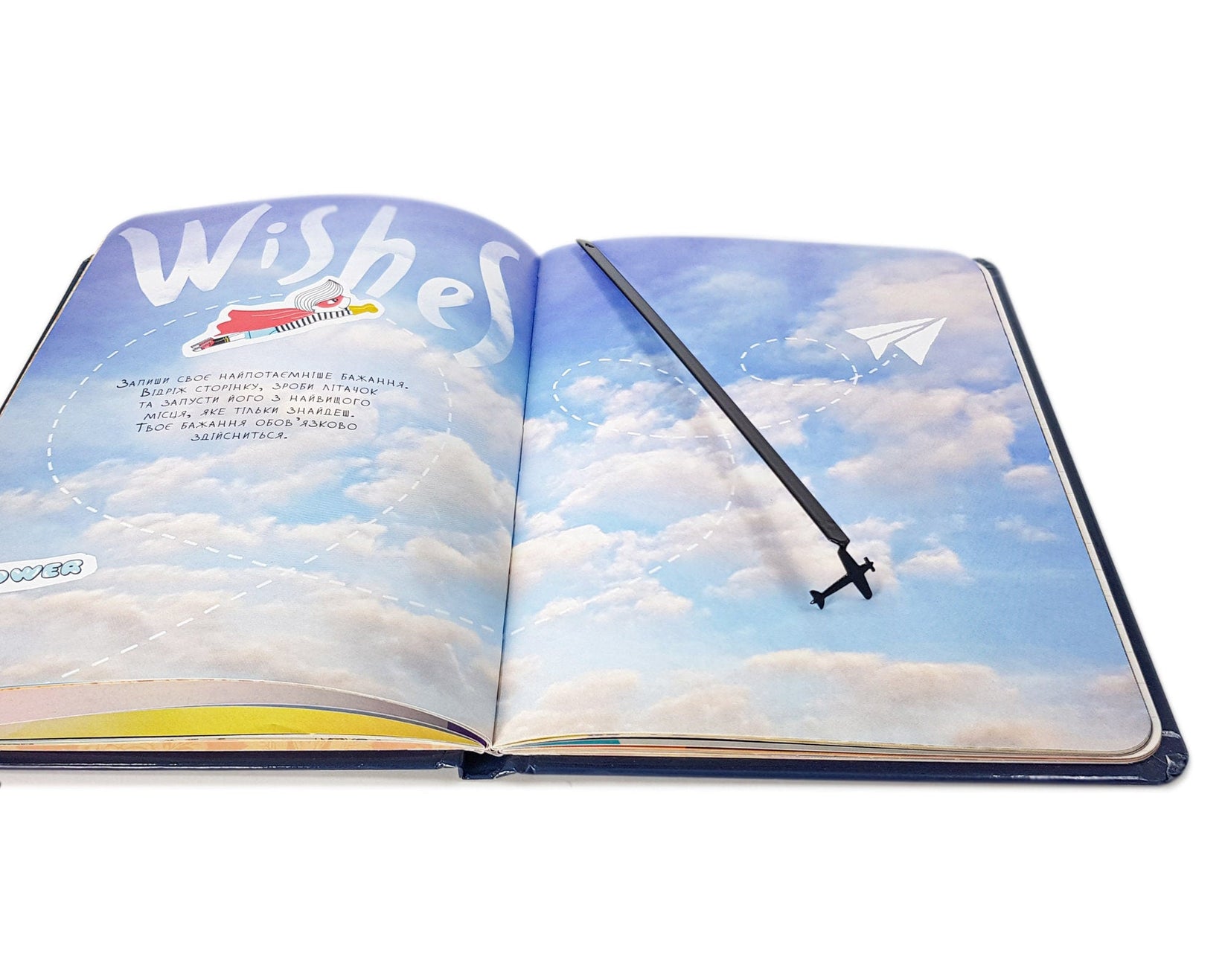 Take a Book Will Fly metal bookmark on an illustrated page