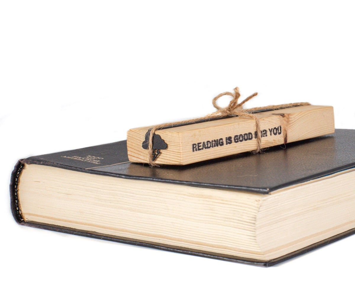 Thunderstorm metal bookmark with the engraved wooden gift block it ships with