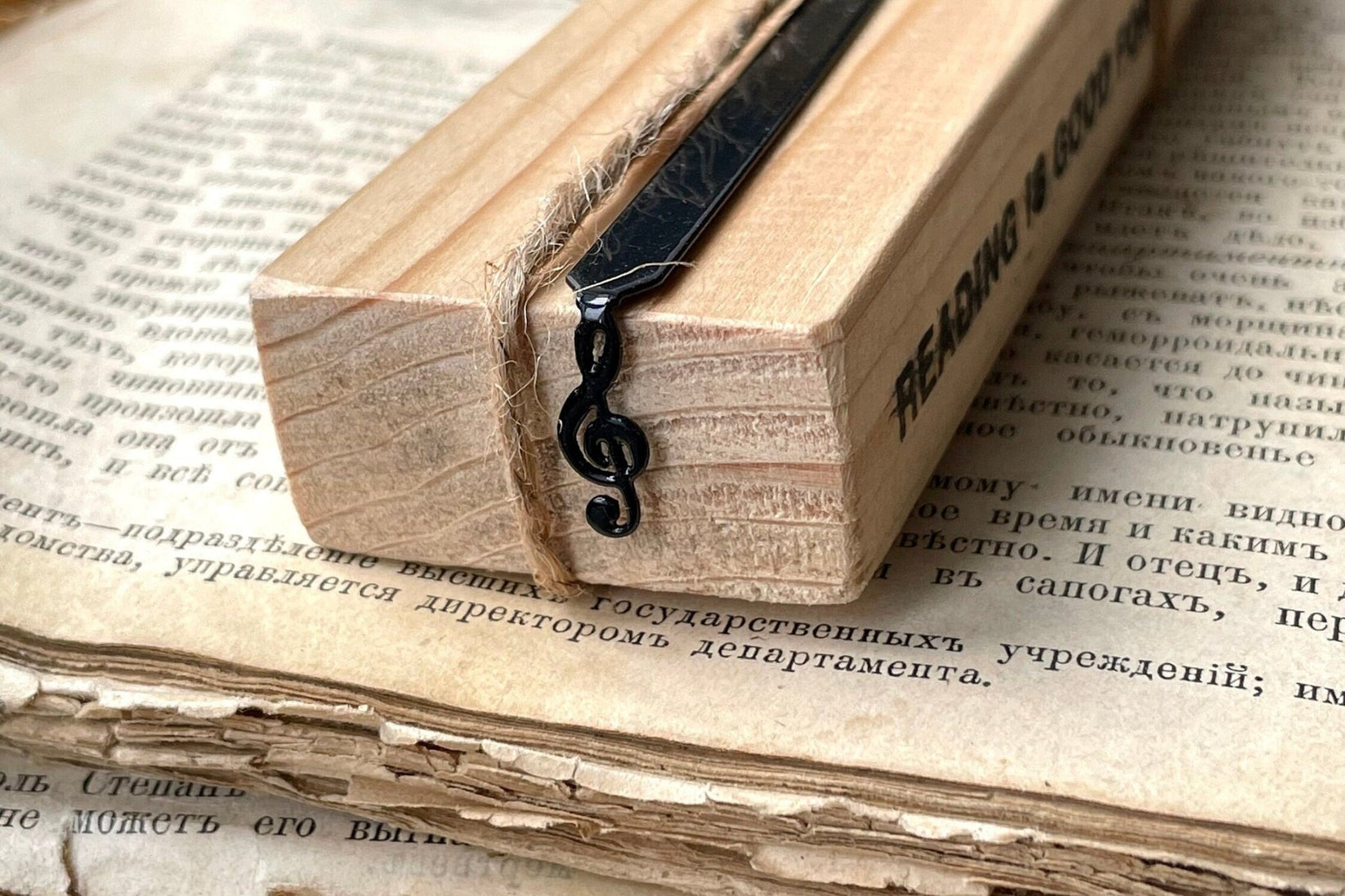 Treble Clef metal bookmark with the engraved wooden gift block it ships with