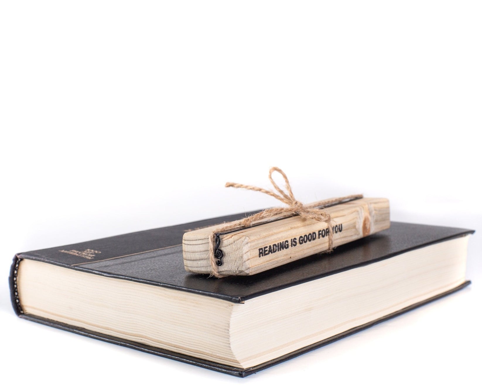 Treble Clef metal bookmark packed with kraft paper and twine as a gift