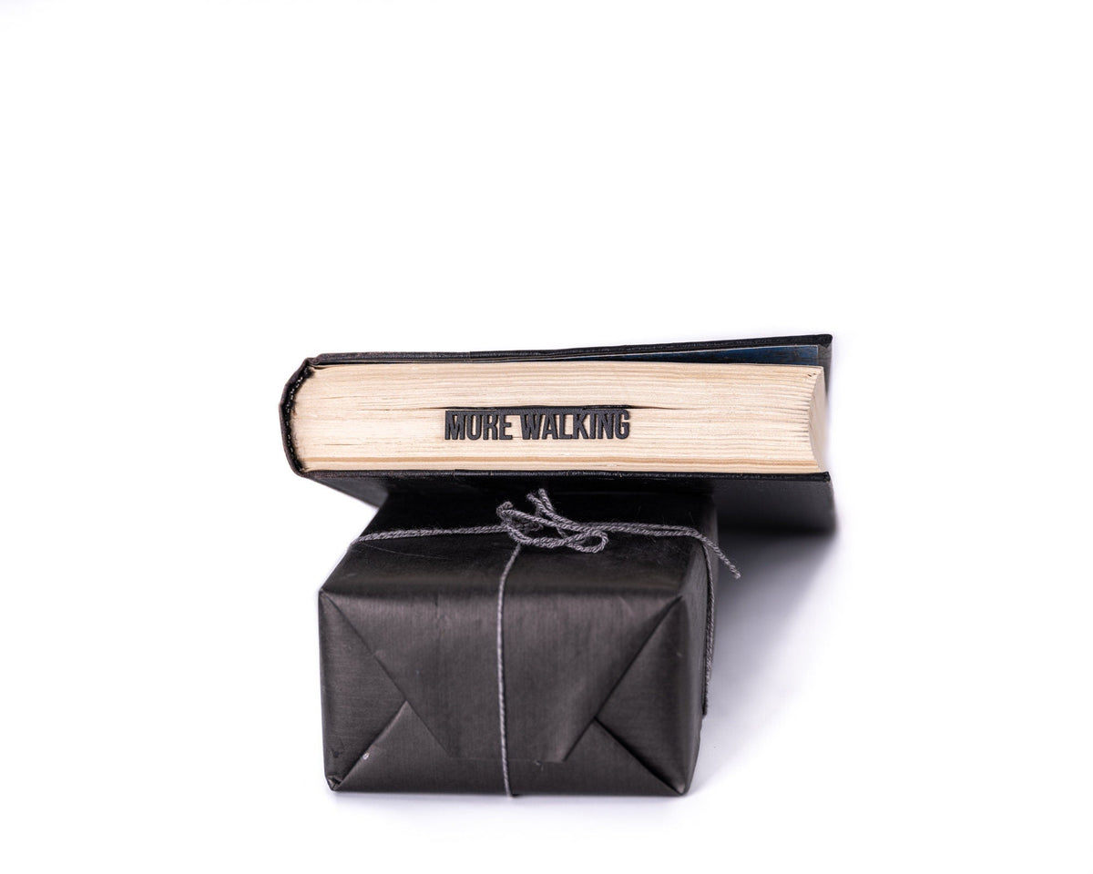 Dog Lover metal bookmark packed with kraft paper and twine as a gift