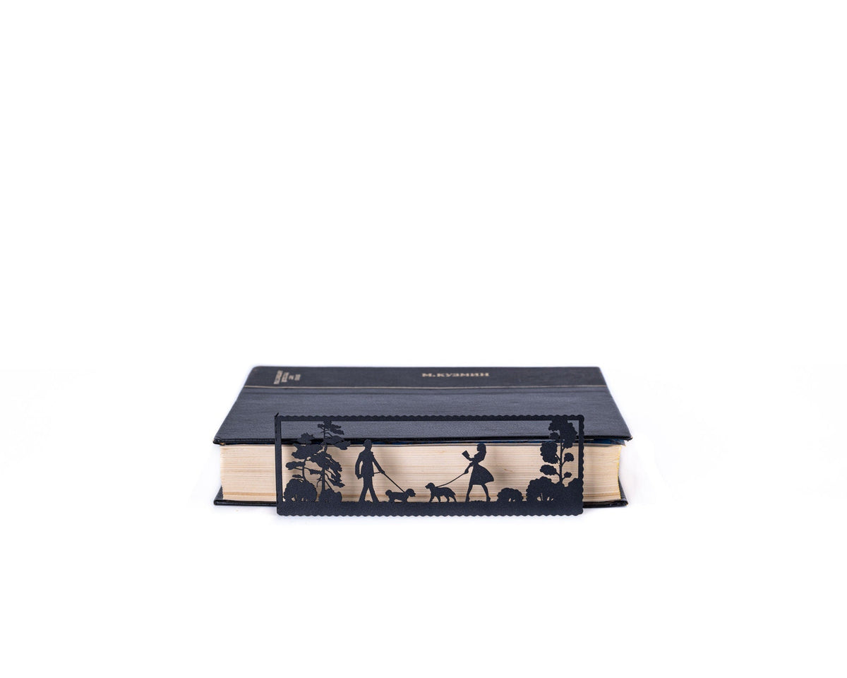 Dog Lover metal bookmark in a closed book, only its top showing above the pages