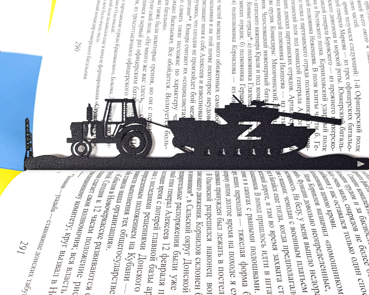 War in Ukraine, Good Evening We Are From Ukraine bookmark resting on the pages of an open book