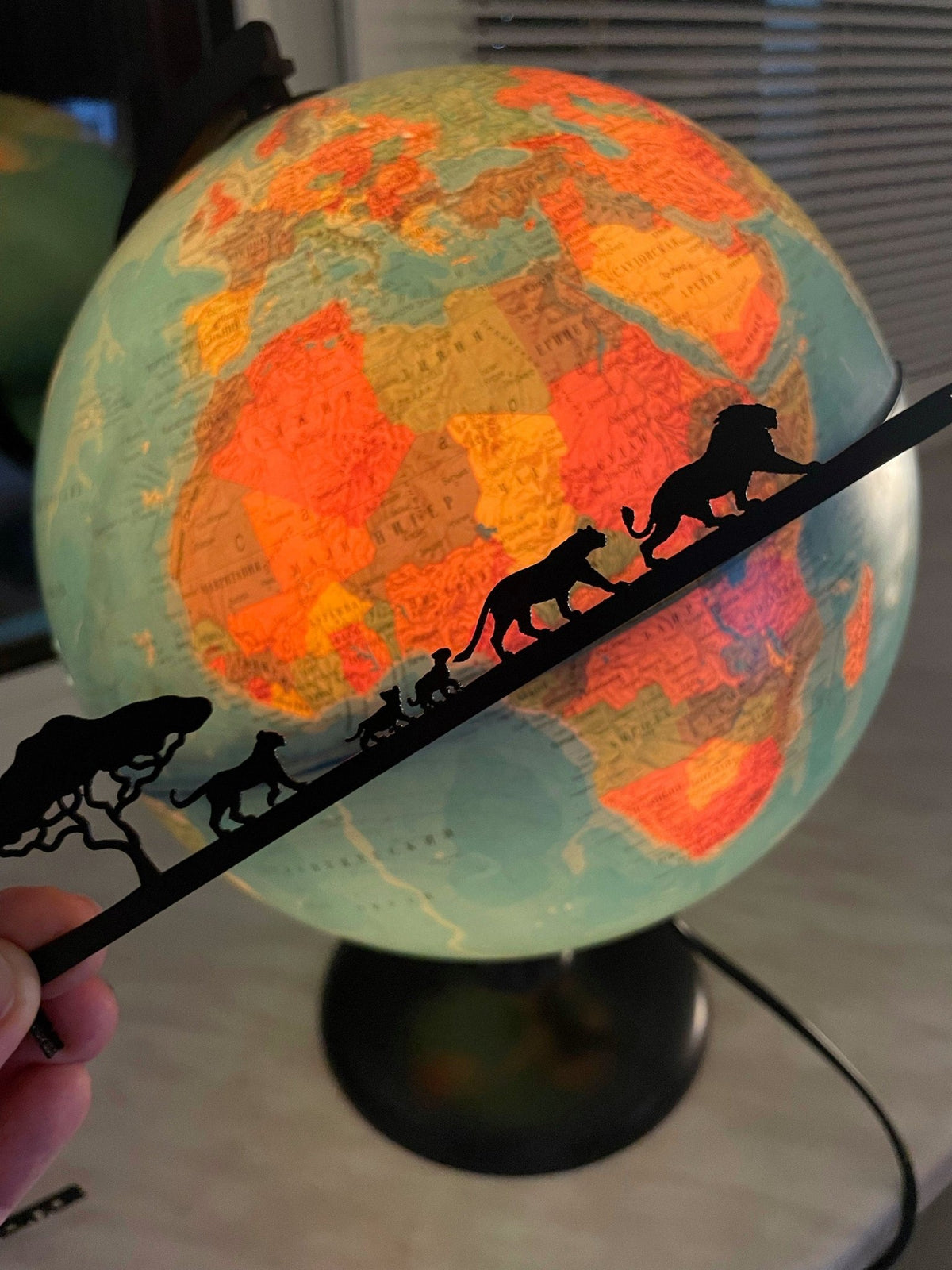 We're a Pride metal bookmark on a coloured background