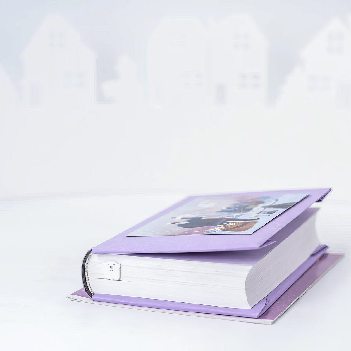 White Bear metal bookmark in white on a coloured background
