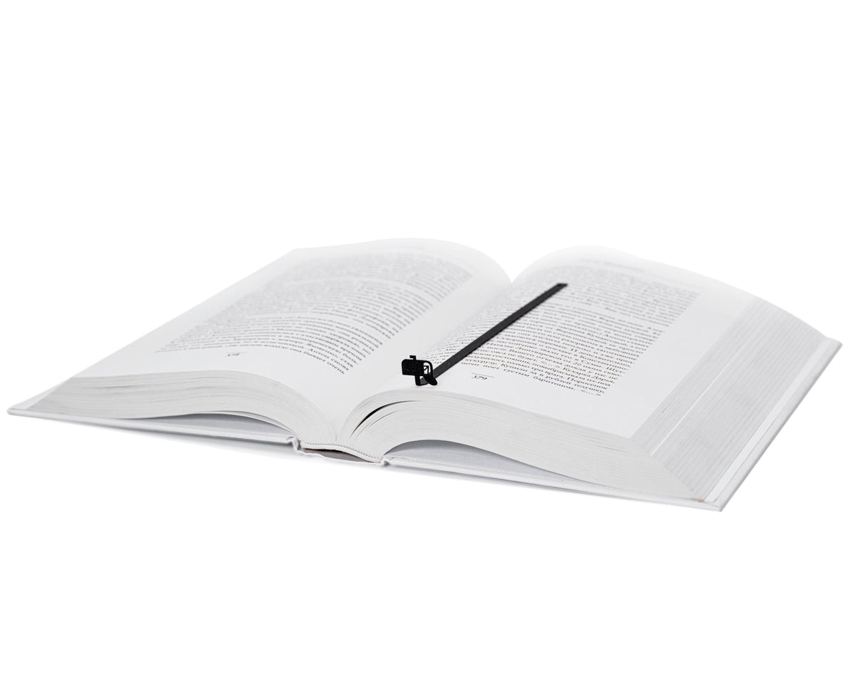 You've Got Mail metal bookmark resting on the pages of an open book