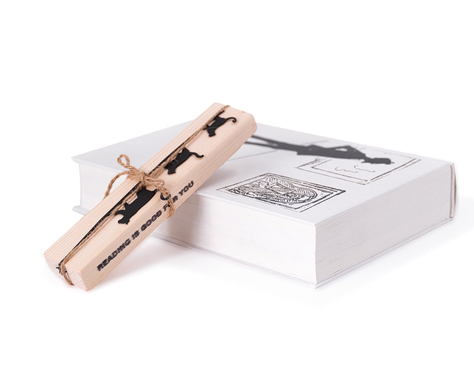 Cats Tightrope Walkers metal bookmark packed with kraft paper and twine as a gift