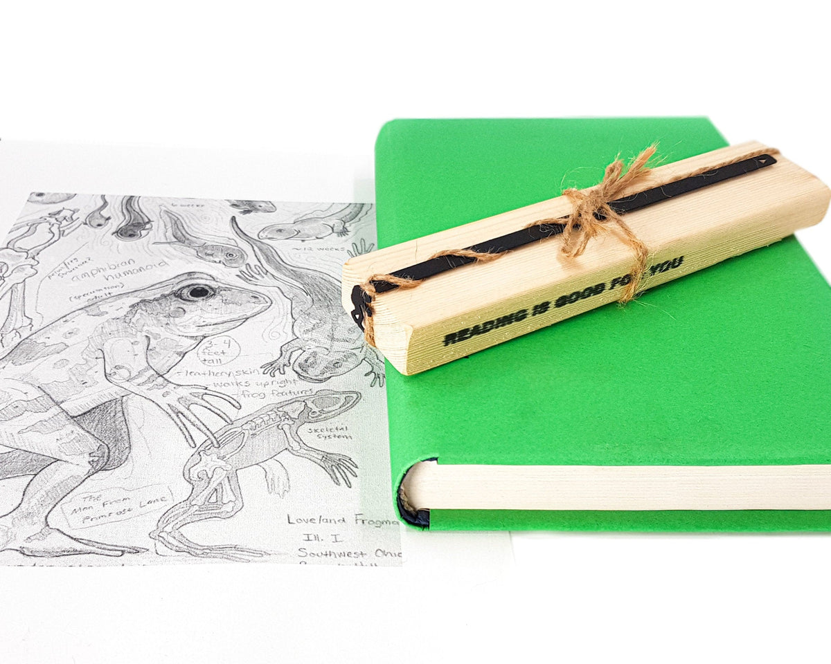 Frogman metal bookmark with the engraved wooden gift block it ships with