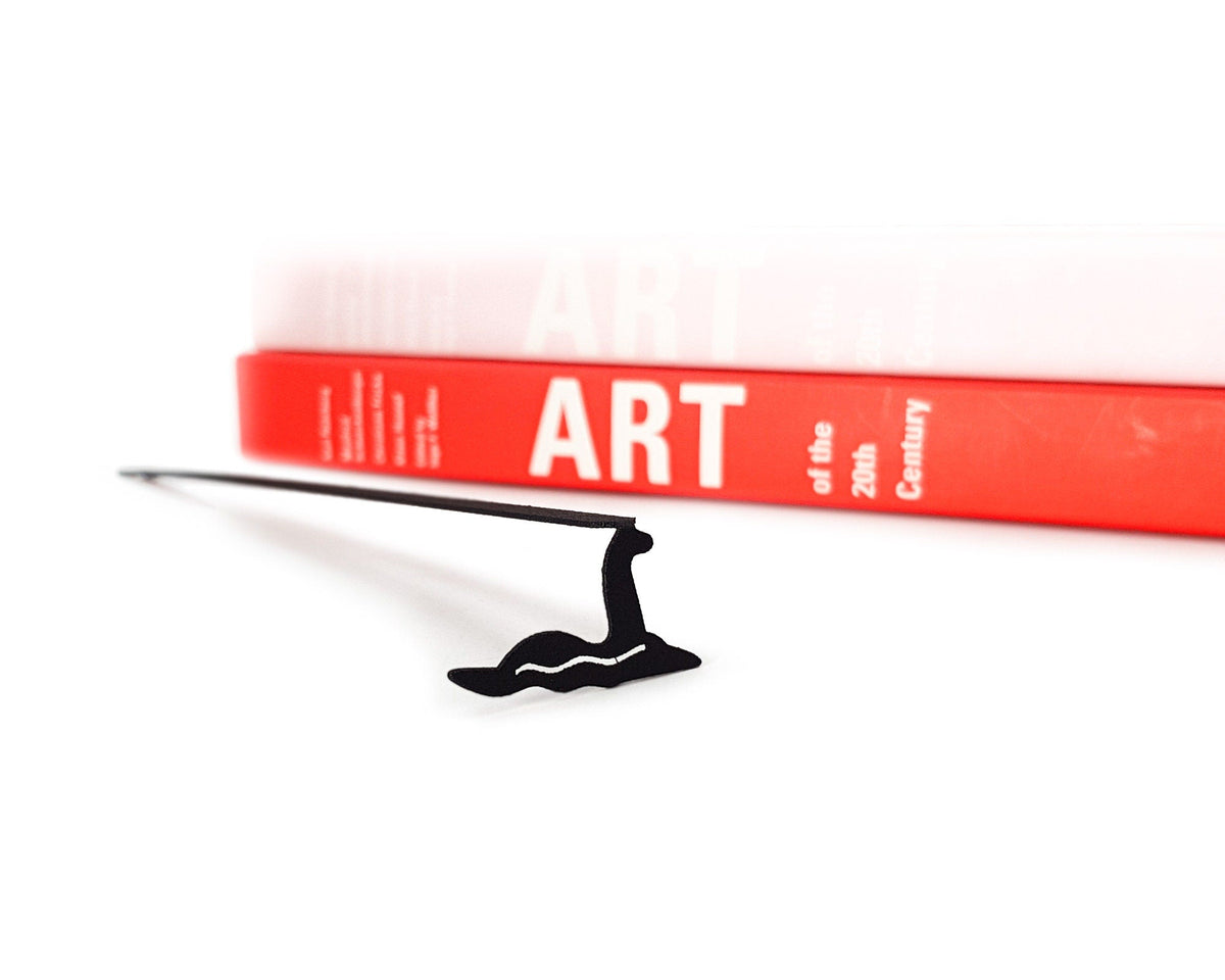Loch Ness metal bookmark seen from the edge of a closed book