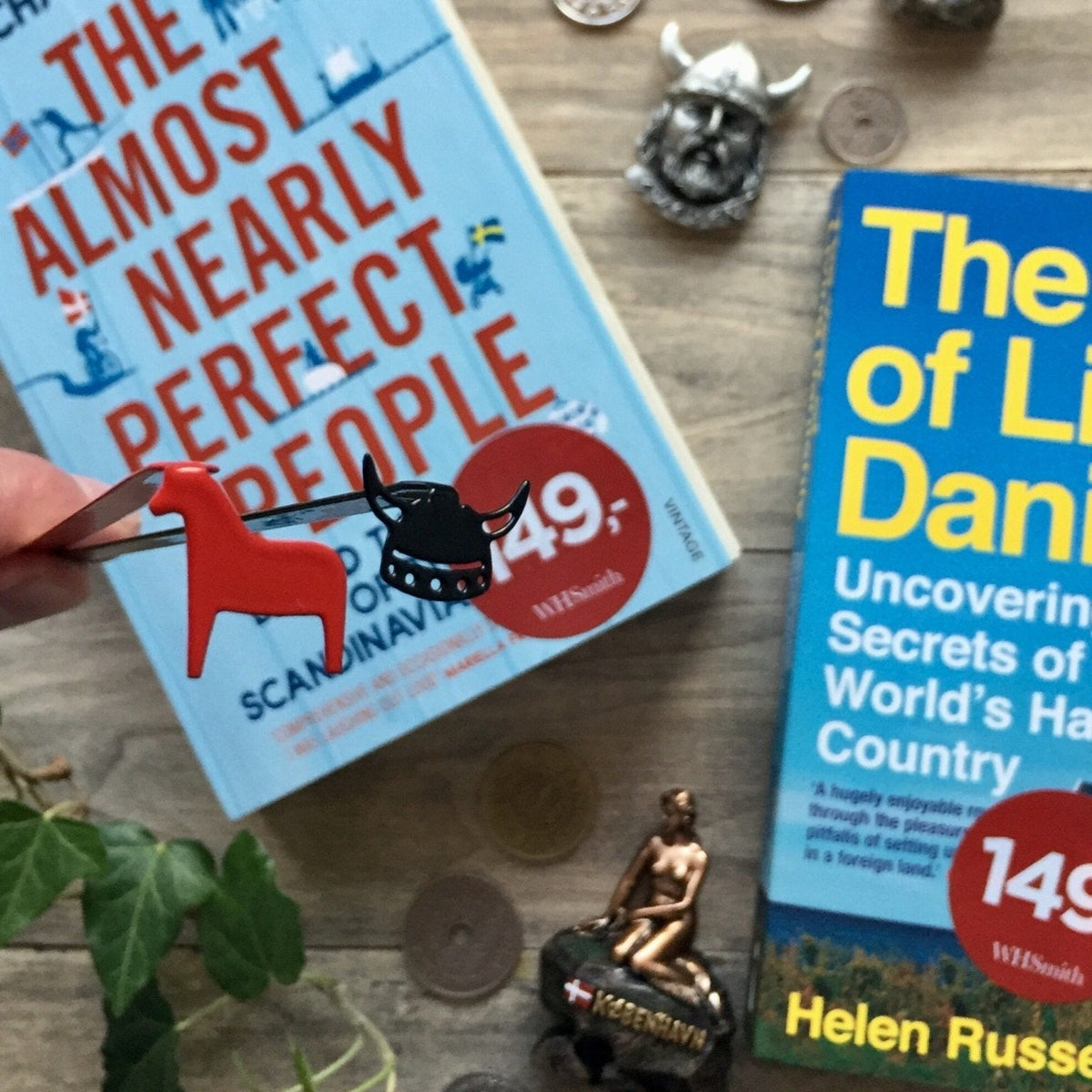 Dala Horse metal bookmark in red on a coloured background