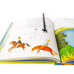 Steel donkey bookmark hanging from top of open adult book, slim profile visible
