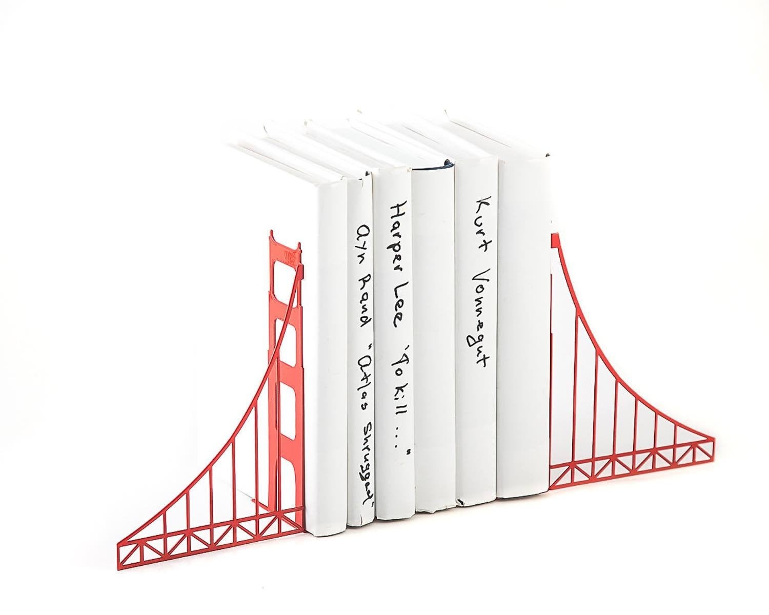 Red Golden Gate Bridge metal bookends holding white books