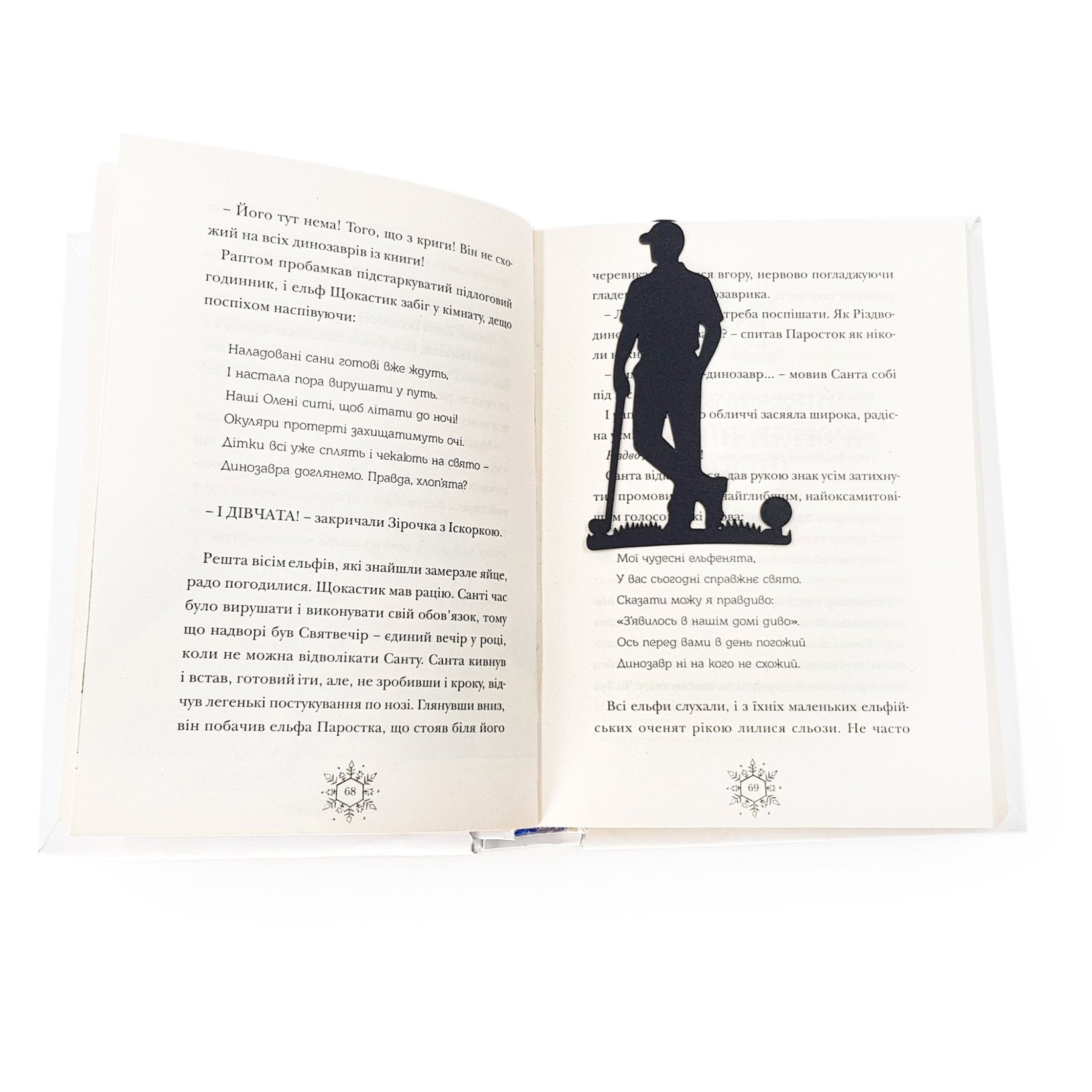 Golf Player metal bookmark marking a page in an open book