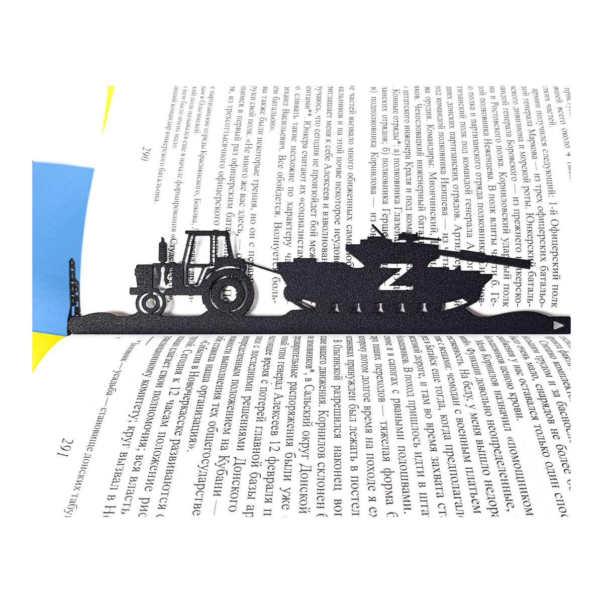 Good Evening We Are from Ukraine metal bookmark resting on the pages of an open book